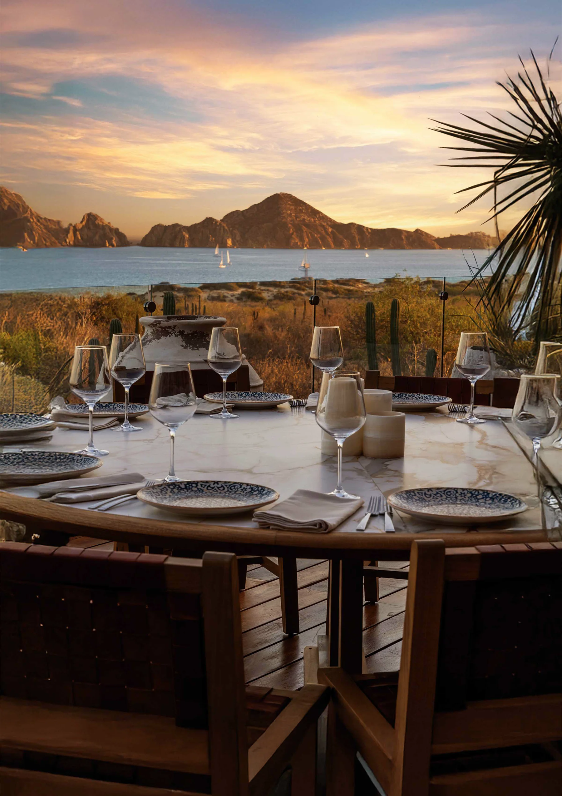 Ilios Los Cabos, a table facing El Arco at sunset